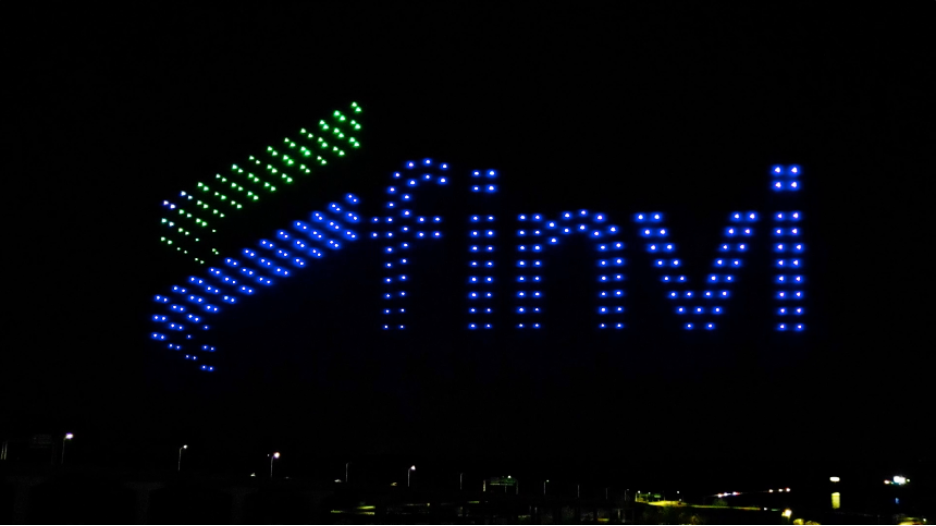 Picture of the Finvi logo in the sky during the Finvi PowerUp Conference drone light show in Savannah, Georgia