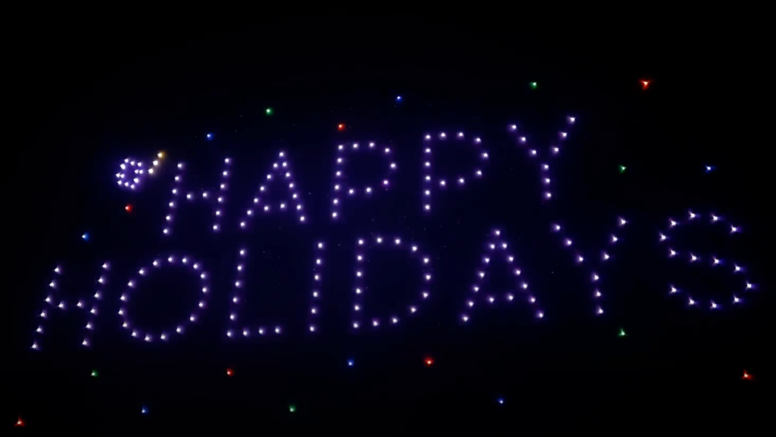 Happy Holidays written in sky at drone light show in Fayettville