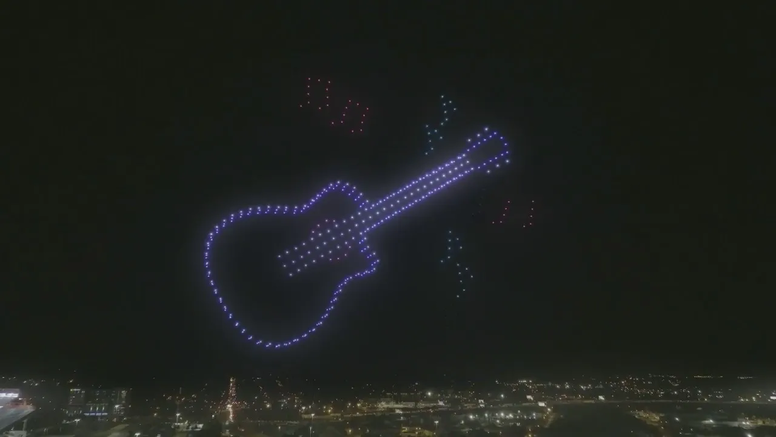 Guitar in sky for Rock the Dock drone light show in Green Bay