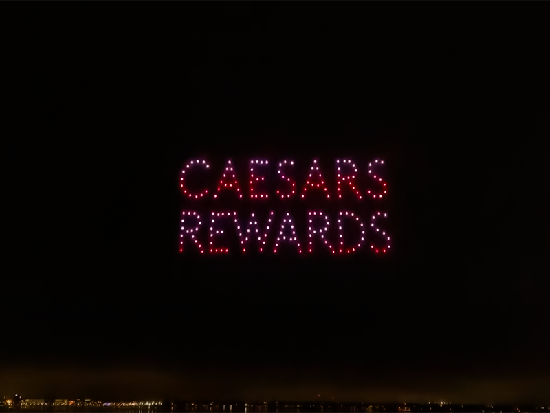 Caesars Rewards written in the sky over Lake Charles in Drone Light Show