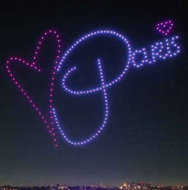 Paris Hilton's iconic signature in sky at 11:11 Media drone light show in Santa Monica